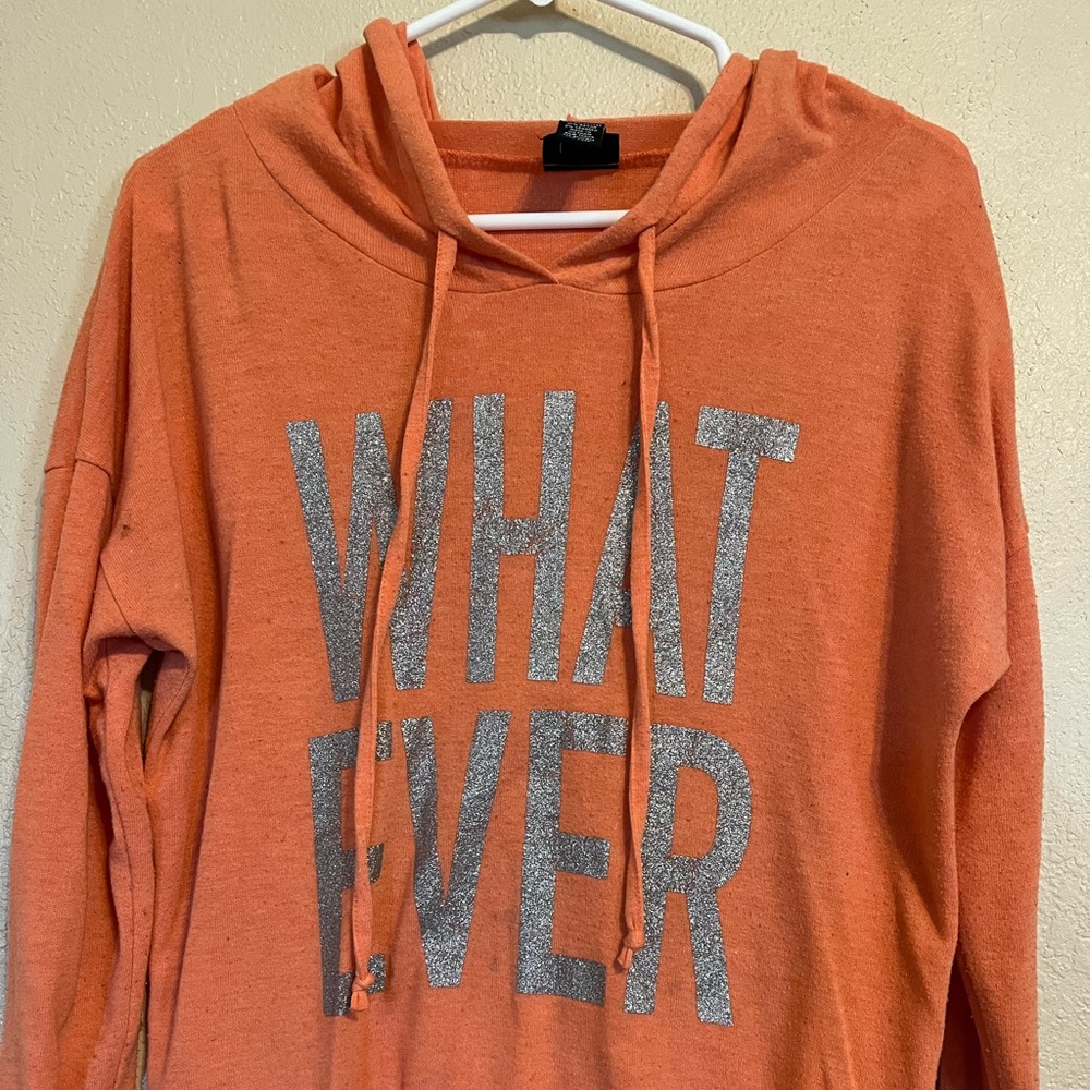 Medium Long Sleeved Rue21 shirt.